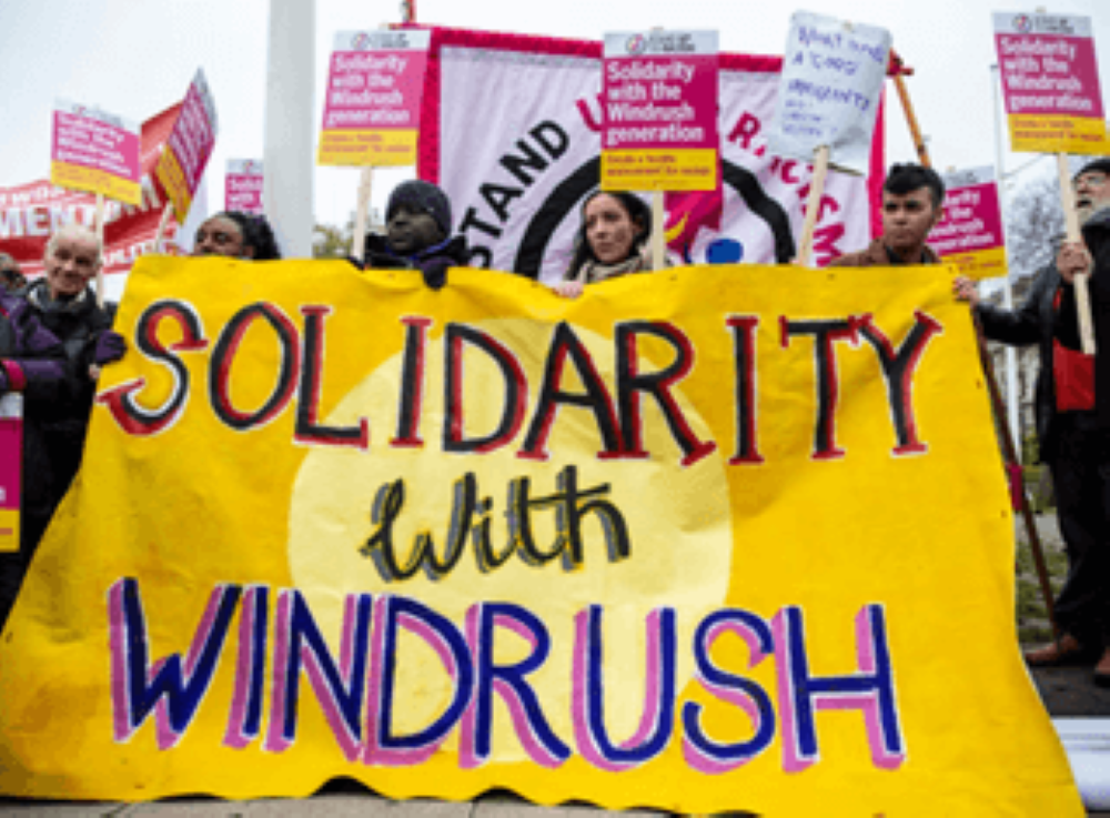<img src="Sony Interactive Entertainment Europe_Windrush Day 2022_03_1000x737.png" alt="People rallying together and carrying signs around the message pf solidarity with Windrush">